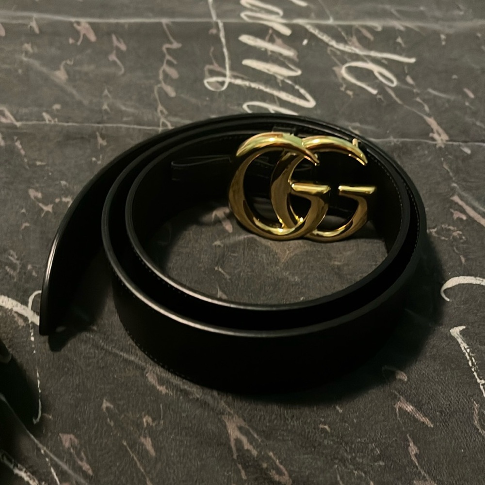 Gucci Belt Black and Gold. Don’t use any more in mint condition .